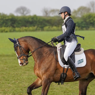 White show breeches with MAYSTON logo on the leg