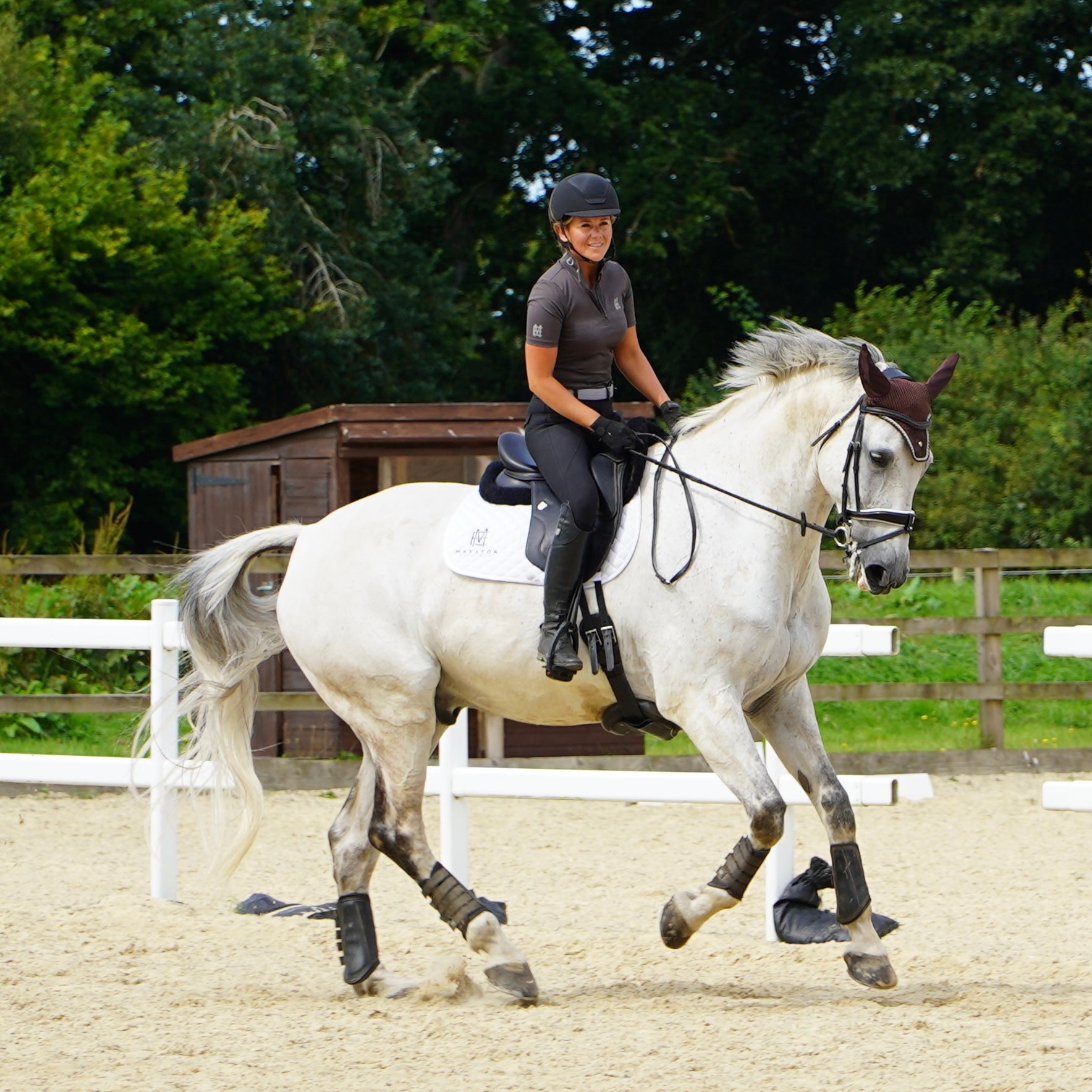 Sleek silhouette baselayer top subtle Mayston branding, maximum coverage without compromising style,  next-level performance with a bold, minimalist look. Moisture-wicking, breathable fabric with four-way stretch, it keeps you cool and comfortable. Training, Everyday or competition wear. Short Sleeve 1/4 zip with collar. grey